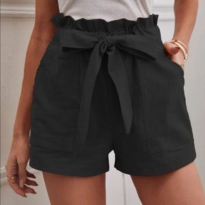 Solid paper bag waist belted shorts